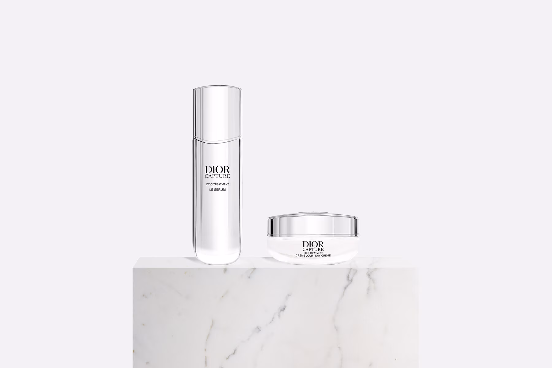 The complete Dior Capture Totale Mother's Day Gift Set beautifully arranged, showing the serum, cream, eye cream, lotion, and elegant pouch.