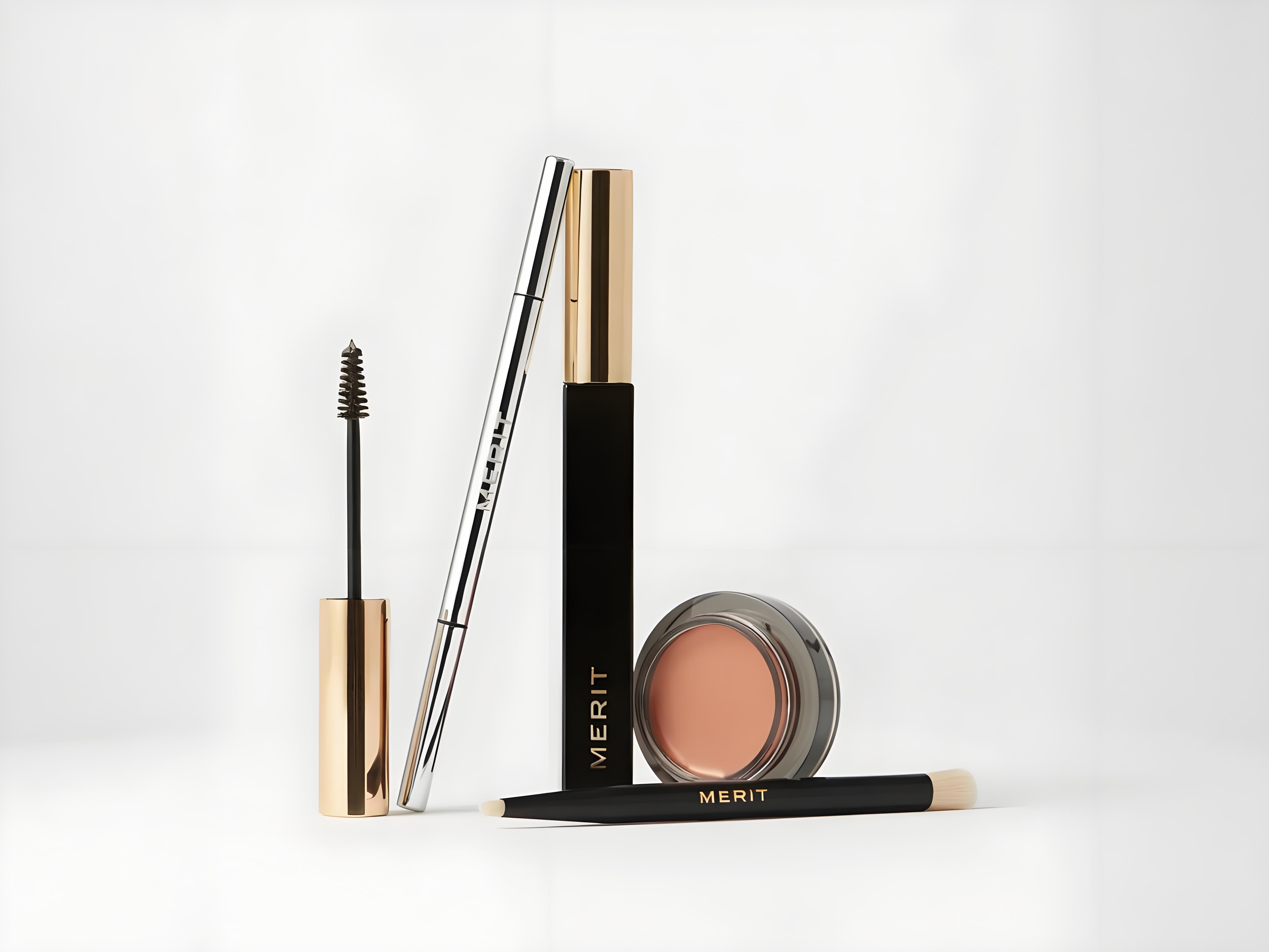 Merit Beauty's The Eye Set (Brush No. 2 and Clean Lash Mascara) displayed with subtle hints of recycled packaging elements.